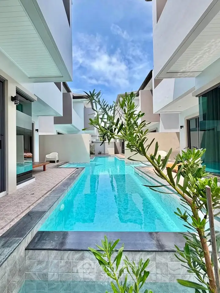Luxurious modern villa with stunning pool and sleek architecture