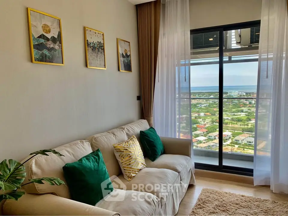 Stylish living room with cozy sofa and stunning balcony view