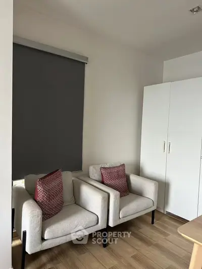 Cozy living room with modern armchairs and stylish decor