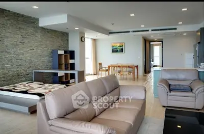 Spacious modern living room with stylish furniture and open layout