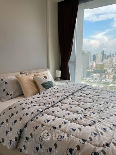 Luxurious bedroom with stunning city view and elegant decor
