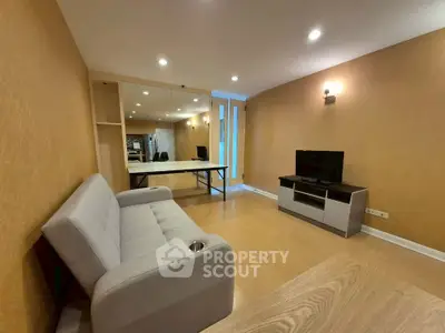 Modern living room with stylish furniture and warm lighting