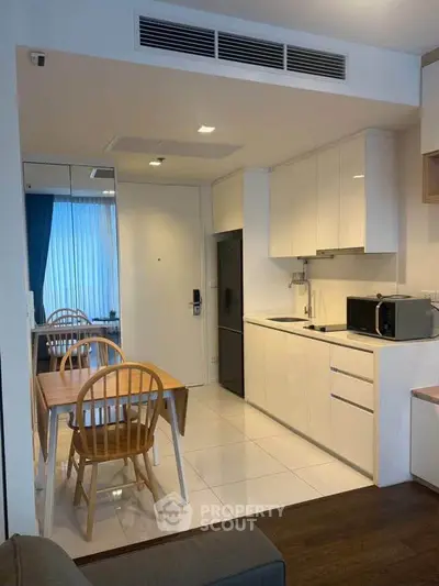 Modern kitchen with dining area in a stylish apartment