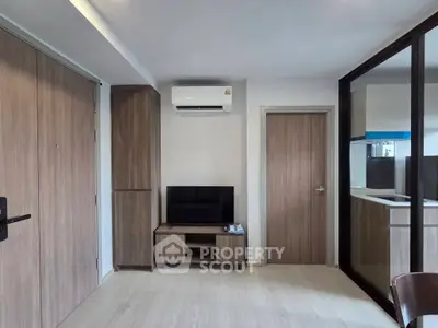 Modern living room with sleek wooden furniture and air conditioning