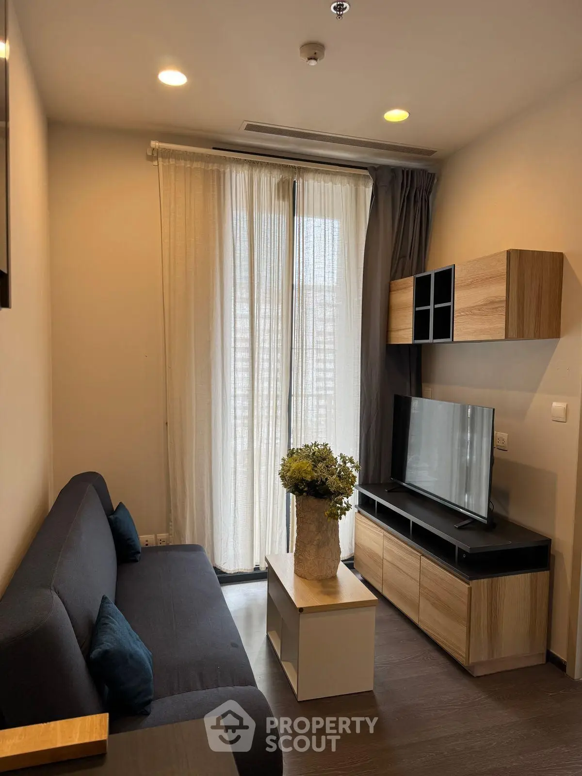 Cozy modern living room with stylish furniture and natural light