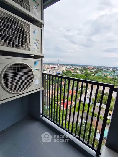 High-rise balcony with air conditioning units and panoramic city view