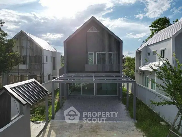 Modern minimalist house with sleek design and spacious outdoor area, perfect for contemporary living.