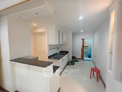 Spacious kitchen with open layout and modern design in a bright apartment