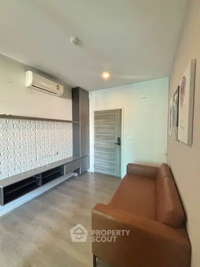 Modern living room with sleek design and air conditioning