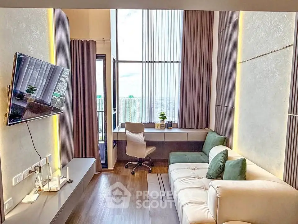 Modern living room with high ceilings, large windows, and stylish decor in a luxury apartment.