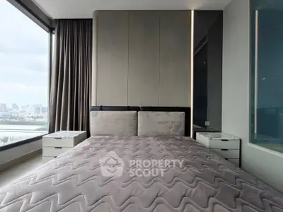 Luxurious bedroom with panoramic city view and modern decor