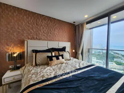 Luxurious bedroom with stunning city view and elegant decor