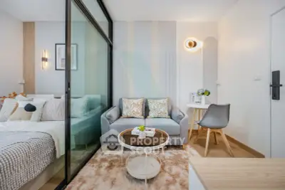 Modern studio apartment with cozy living area and stylish decor