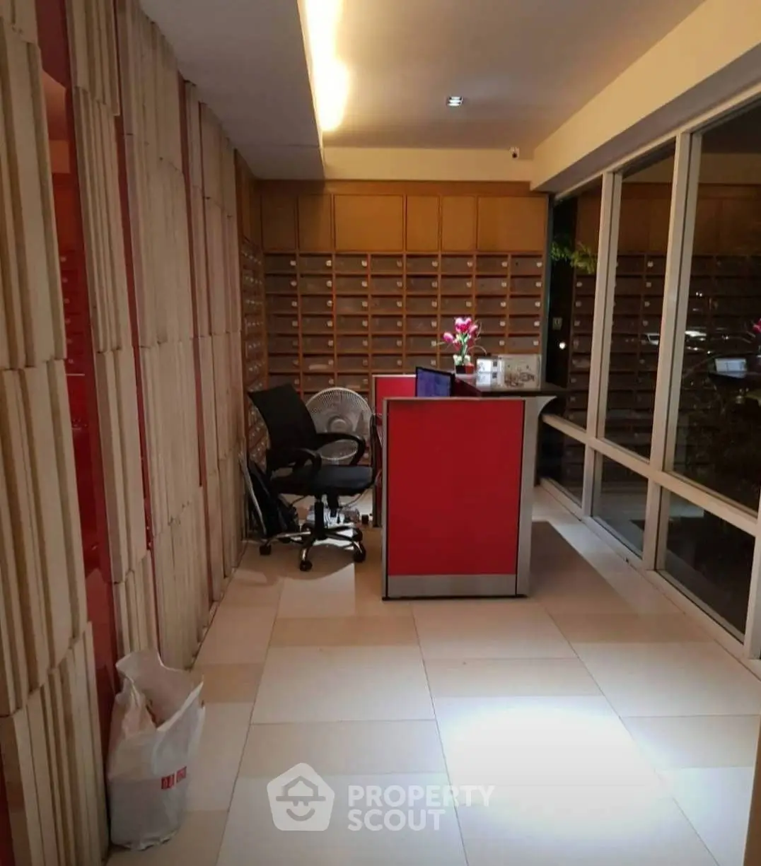 Modern office space with sleek design and large windows for natural light.