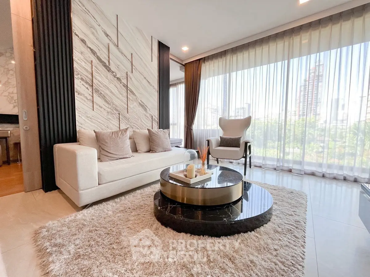 Luxurious modern living room with elegant decor and panoramic city views.