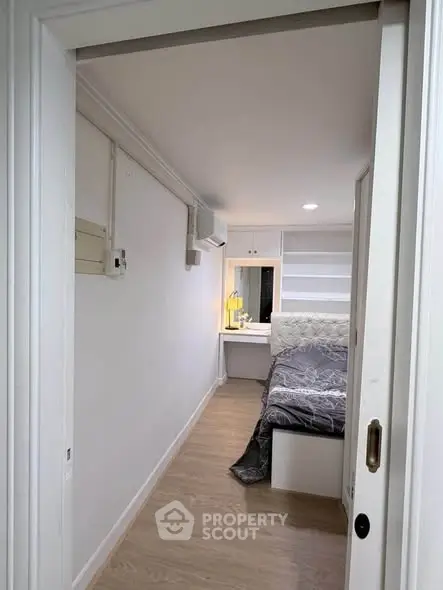 Cozy bedroom with modern decor and built-in storage solutions