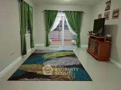 Spacious living room with elegant curtains and modern decor