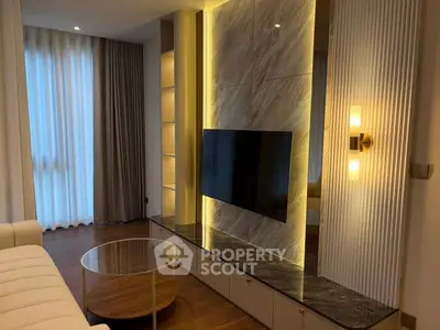 Modern living room with stylish lighting and sleek TV setup