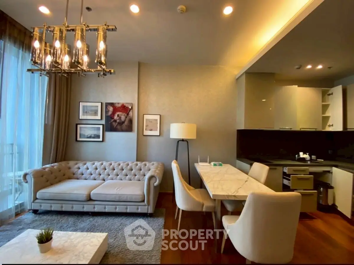 Luxurious modern living room with elegant decor and open kitchen layout