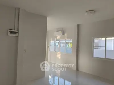 Bright and airy living space with large windows and modern finishes