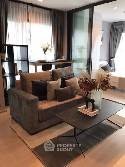 Modern living room with stylish sofa and elegant decor in a contemporary apartment.