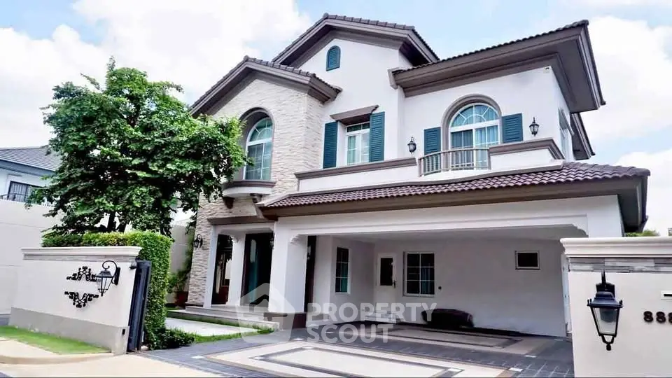 Elegant two-story house with modern architecture and spacious driveway