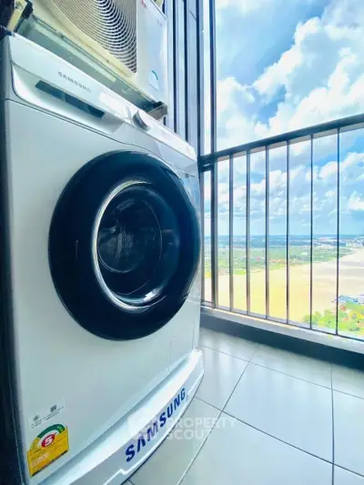 Modern balcony with washing machine and stunning panoramic view