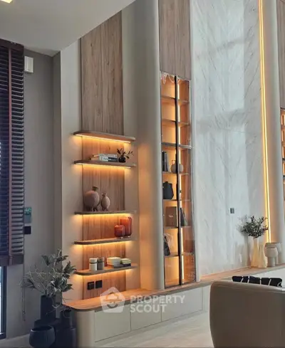 Luxurious modern living room with elegant shelving and ambient lighting