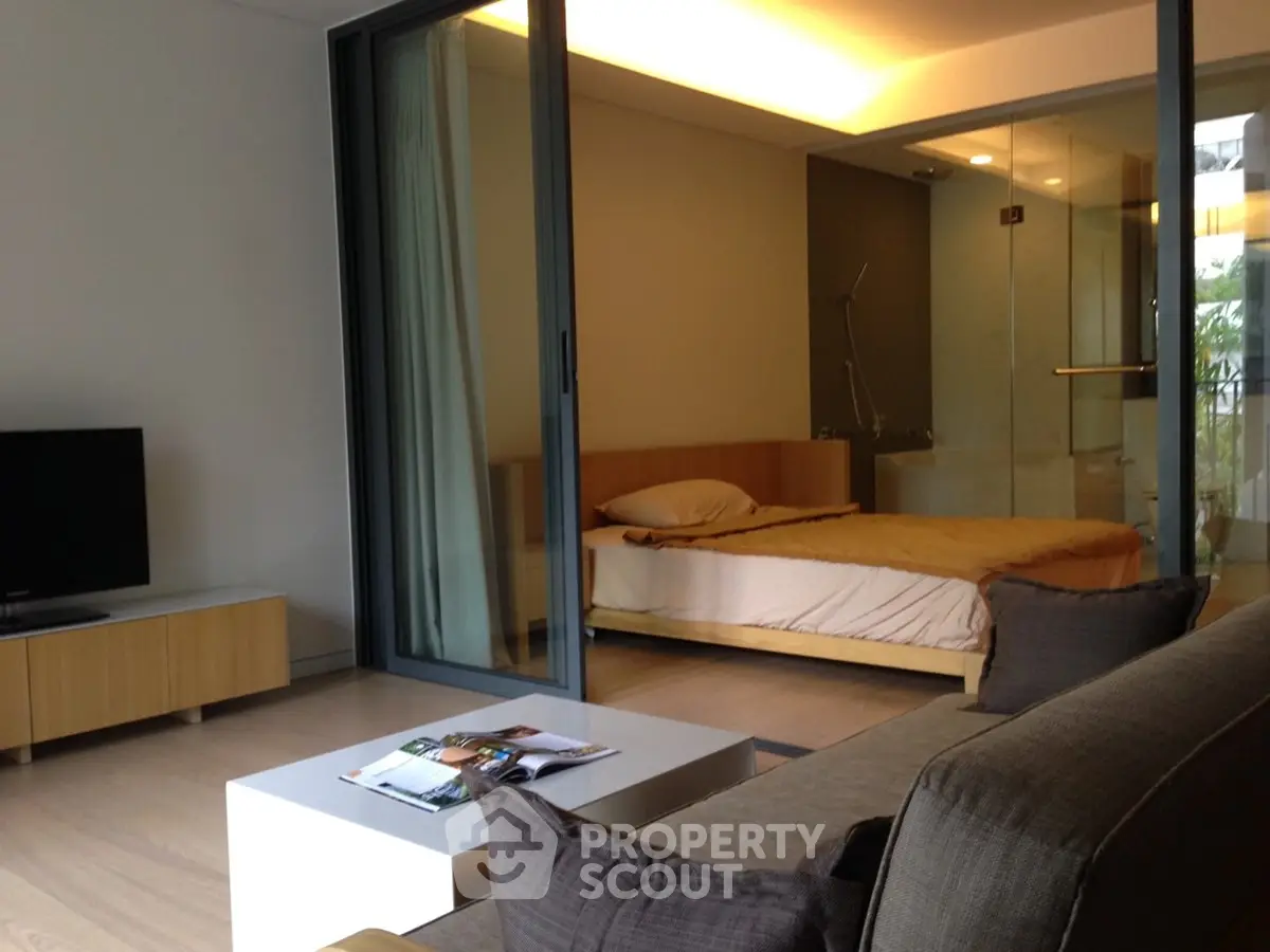 Modern studio apartment with open layout and stylish furnishings