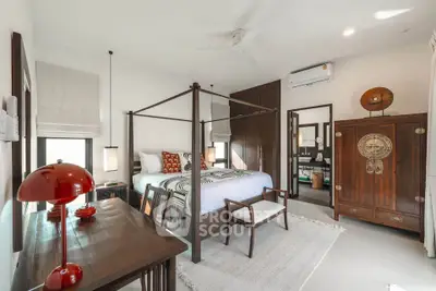 Luxurious bedroom with elegant four-poster bed and stylish decor
