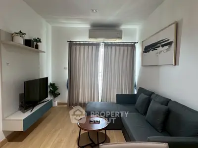 Modern living room with sleek furniture and natural light