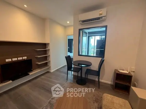 Modern living room with air conditioning and balcony view