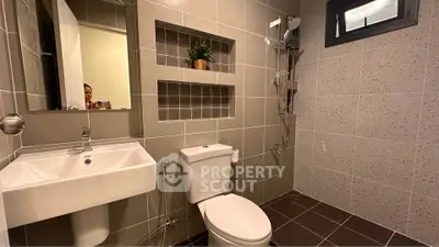 Modern bathroom with sleek fixtures and stylish tile design