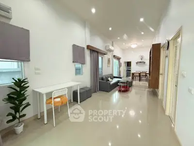 Spacious modern living room with open layout and elegant decor