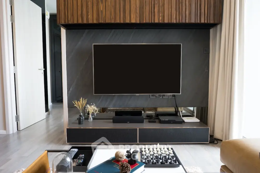 Modern living room with sleek TV setup and stylish decor