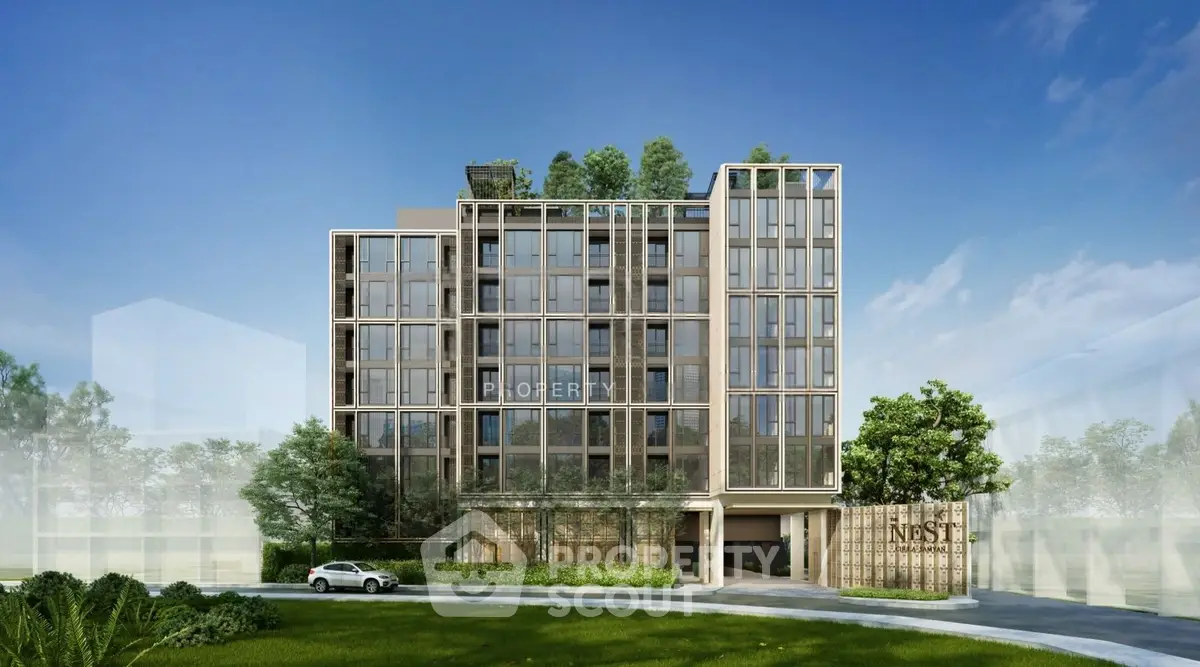 Modern residential building with lush greenery and sleek design, showcasing urban living at its finest.