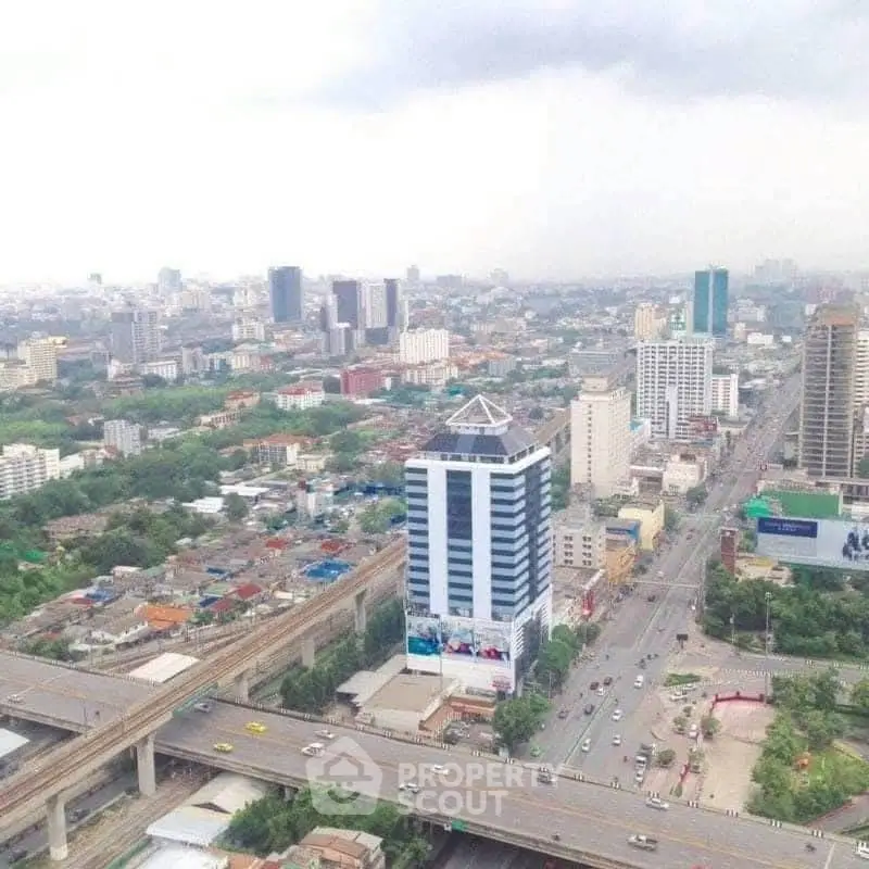 Stunning cityscape view showcasing urban architecture and bustling streets from a high vantage point.