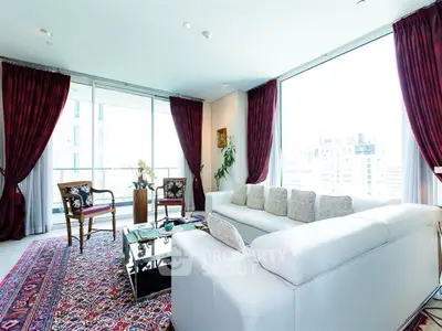 Luxurious living room with elegant decor and city view