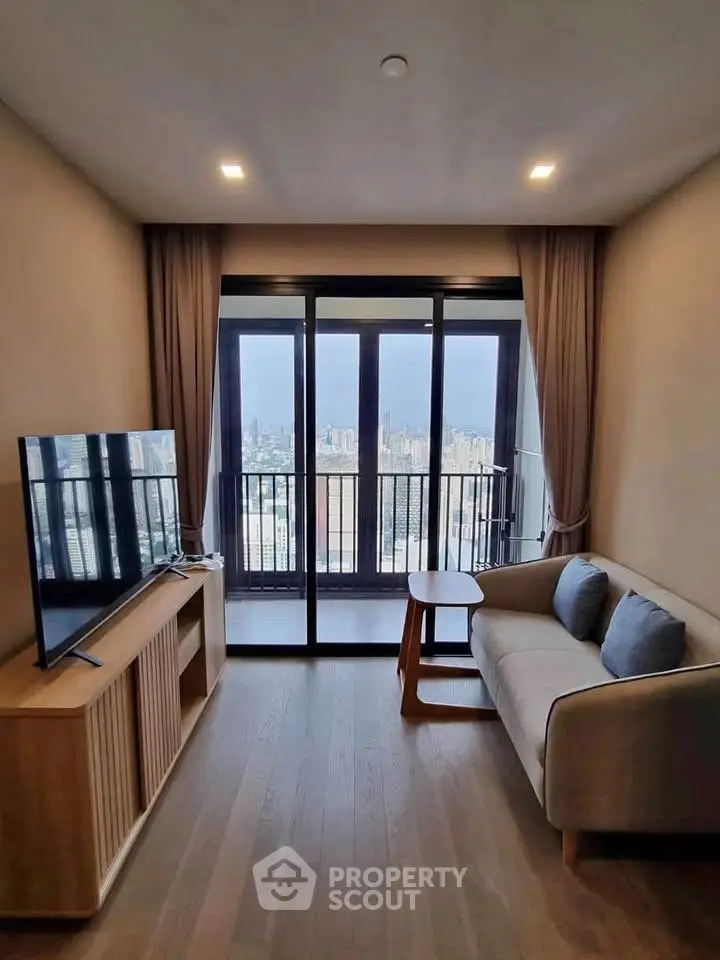 Modern living room with city view and balcony access