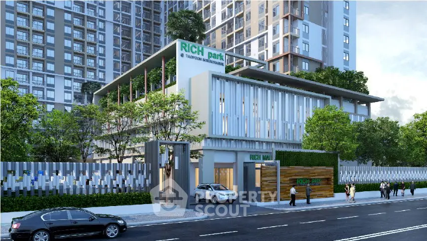 Modern high-rise building with lush greenery and sleek entrance, ideal for urban living.