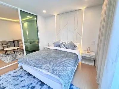 Modern bedroom with stylish decor and cozy ambiance in a contemporary apartment.