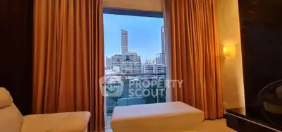 Luxurious living room with city view through large window and elegant curtains.