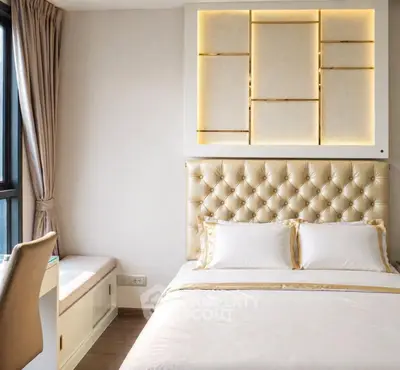 Luxurious bedroom with elegant tufted headboard and ambient lighting