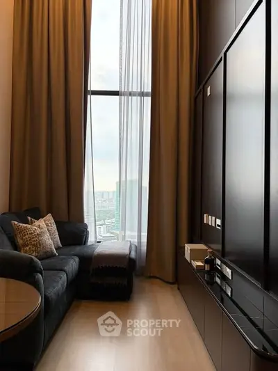 Luxurious living room with high ceilings and stunning city view