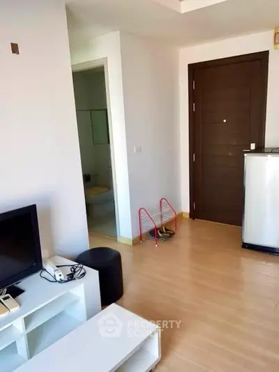 Modern apartment interior with wooden flooring and stylish furniture
