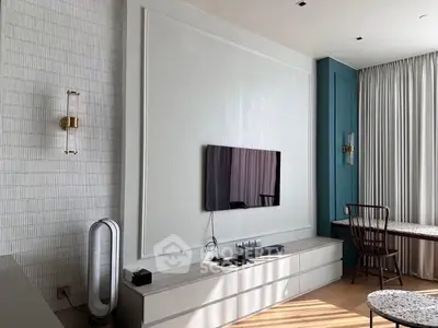 Modern living room with wall-mounted TV and stylish decor