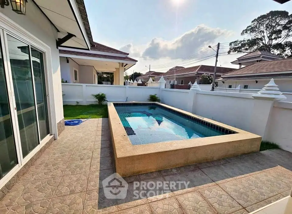 Charming villa with private pool and spacious patio in serene neighborhood.