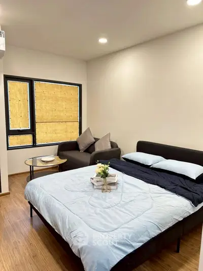 Modern bedroom with cozy bed and stylish decor