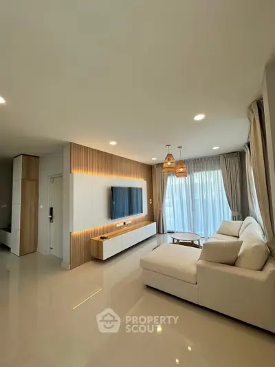 Modern living room with sleek design and natural light