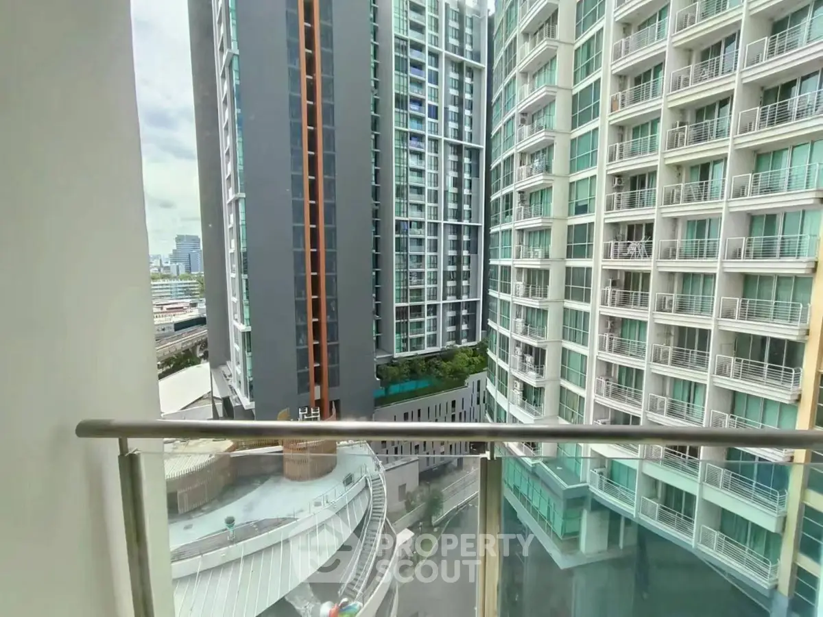 Stunning cityscape view from a modern high-rise balcony, perfect for urban living enthusiasts.